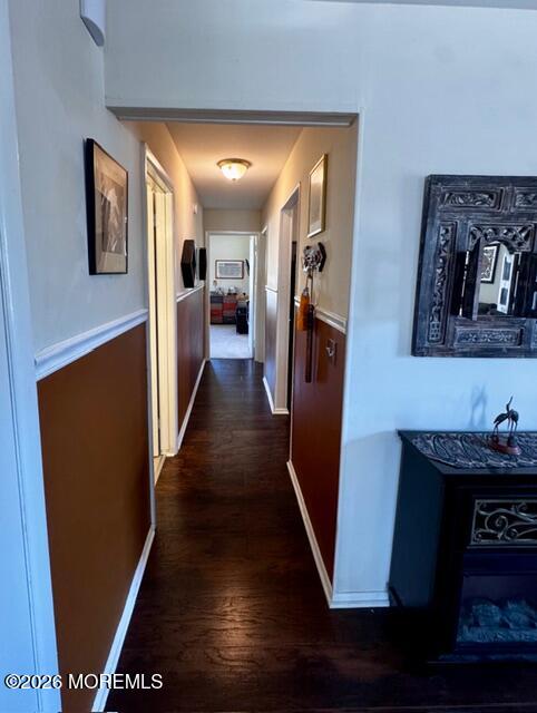 4 Dogwood Road Manahawkin, NJ 08050 - Photo 9 of 28 a view of a hallway with wooden floor and staircase