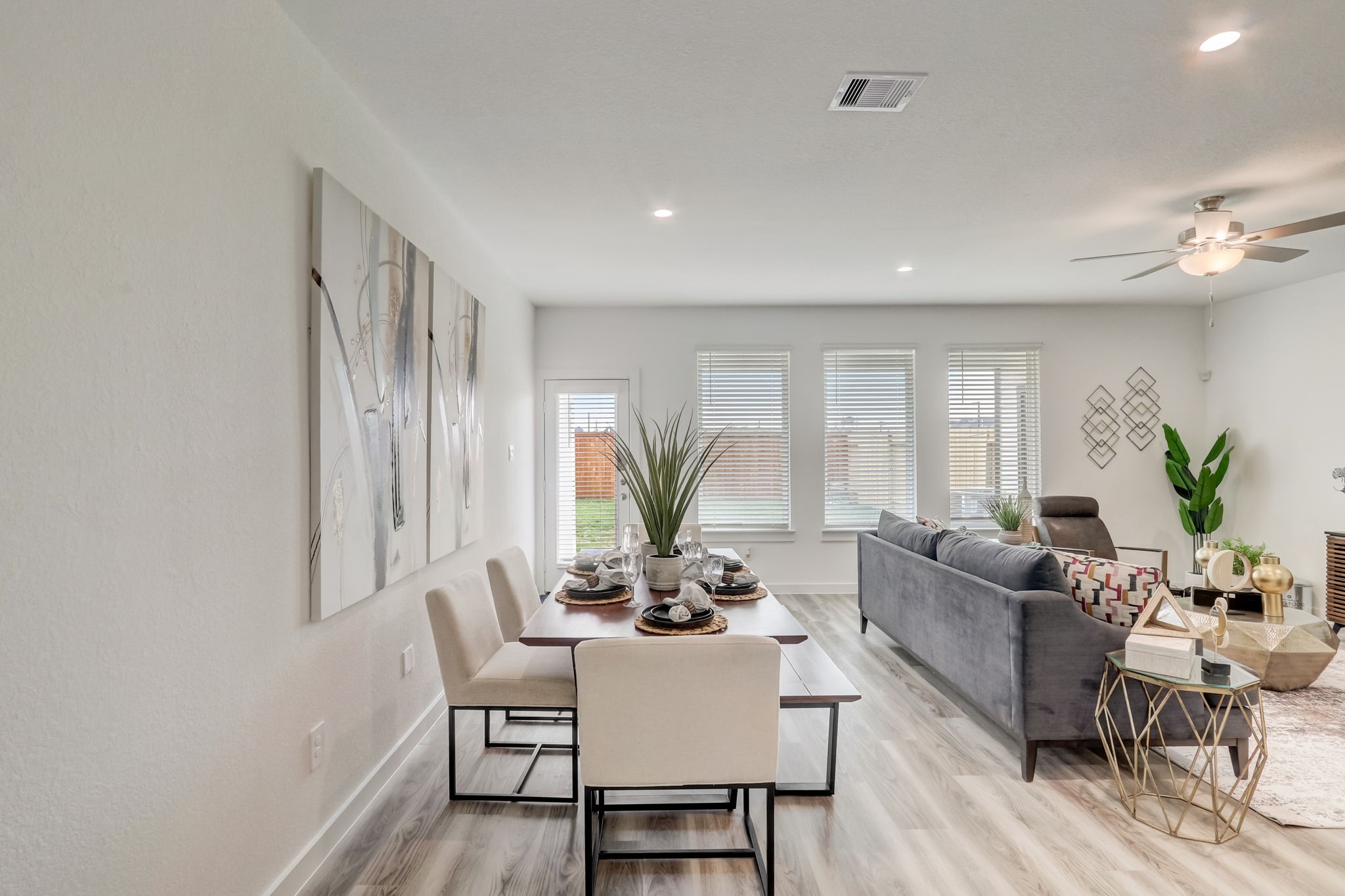 2631 Callahan Springs Lane Houston, TX 77051 - Photo 12 of 50 a living room with furniture potted plant and a window