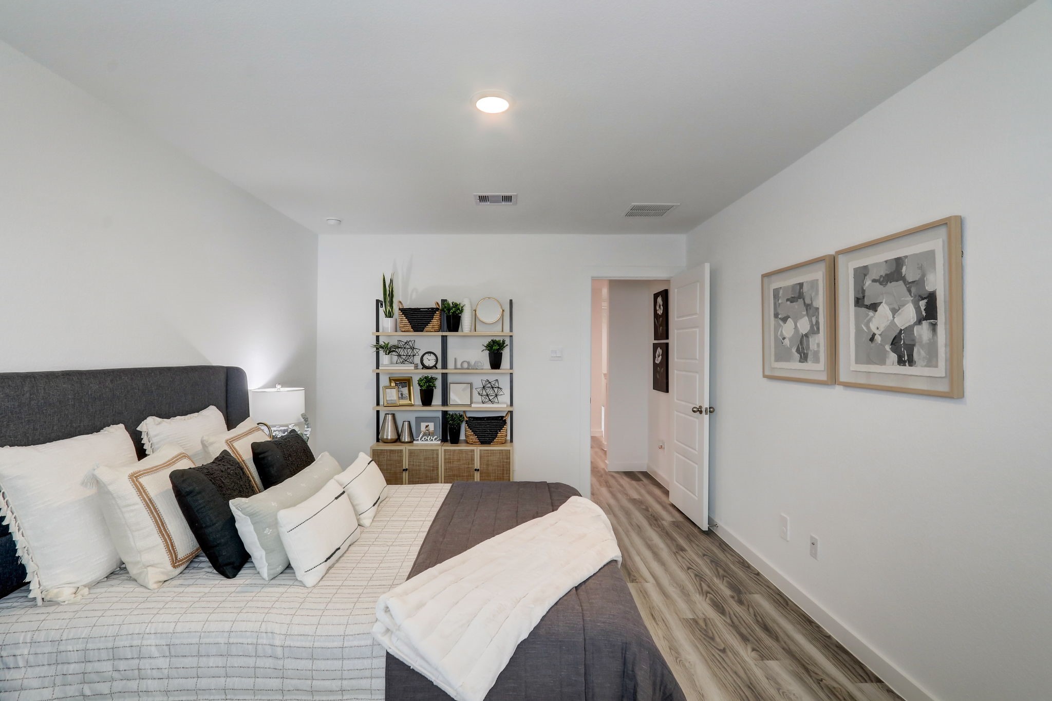 2631 Callahan Springs Lane Houston, TX 77051 - Photo 24 of 50 a bedroom with a bed and closet