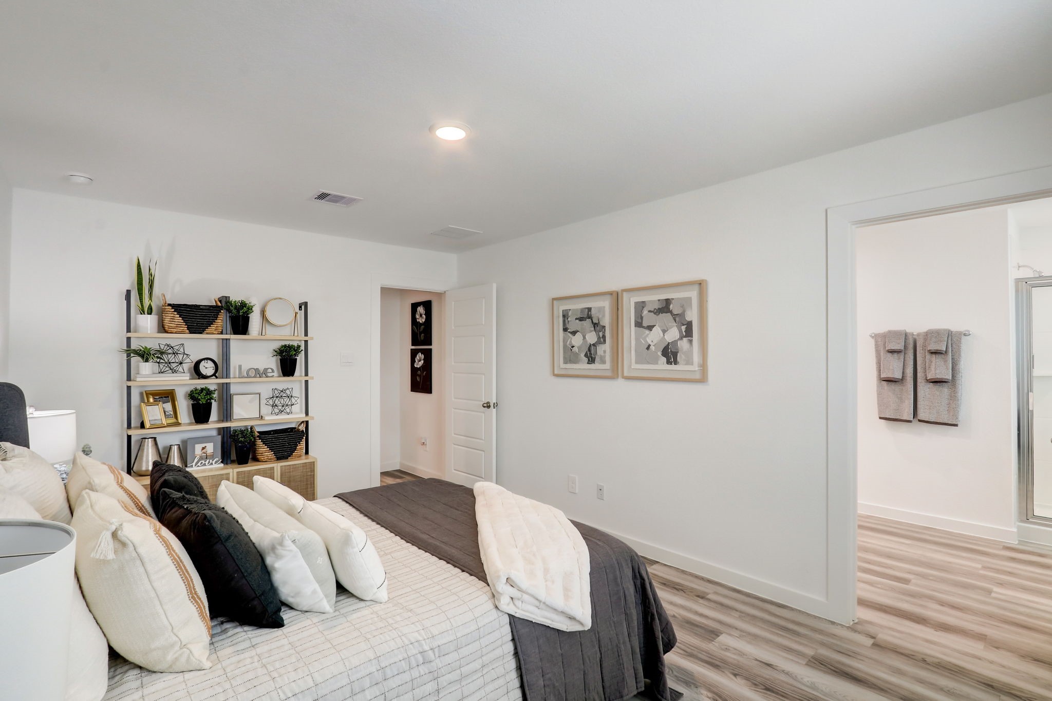 2631 Callahan Springs Lane Houston, TX 77051 - Photo 30 of 50 a bedroom with a bed and a wooden floor