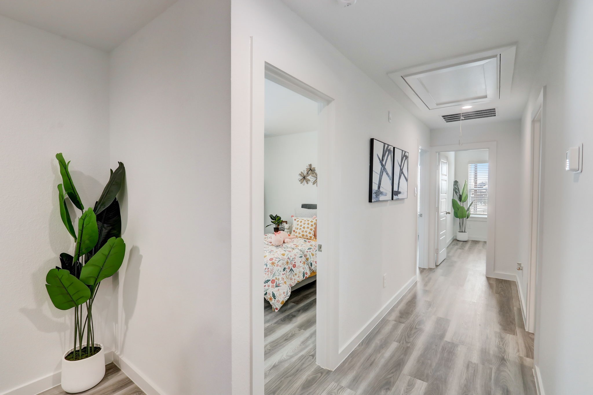 2631 Callahan Springs Lane Houston, TX 77051 - Photo 34 of 50 a view of a hallway to a livingroom with wooden floor