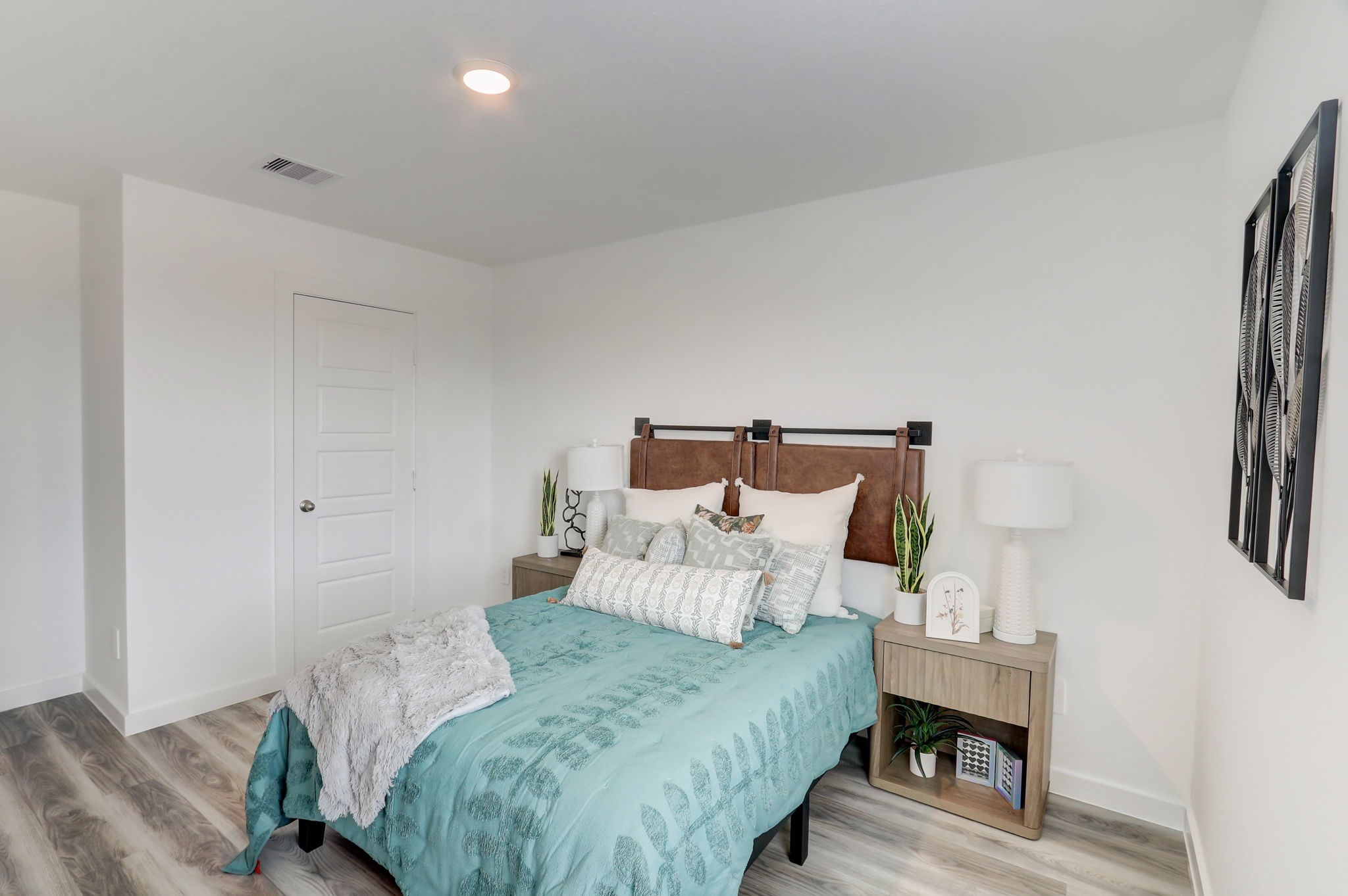 2631 Callahan Springs Lane Houston, TX 77051 - Photo 40 of 50 a bedroom with a bed and a night stand