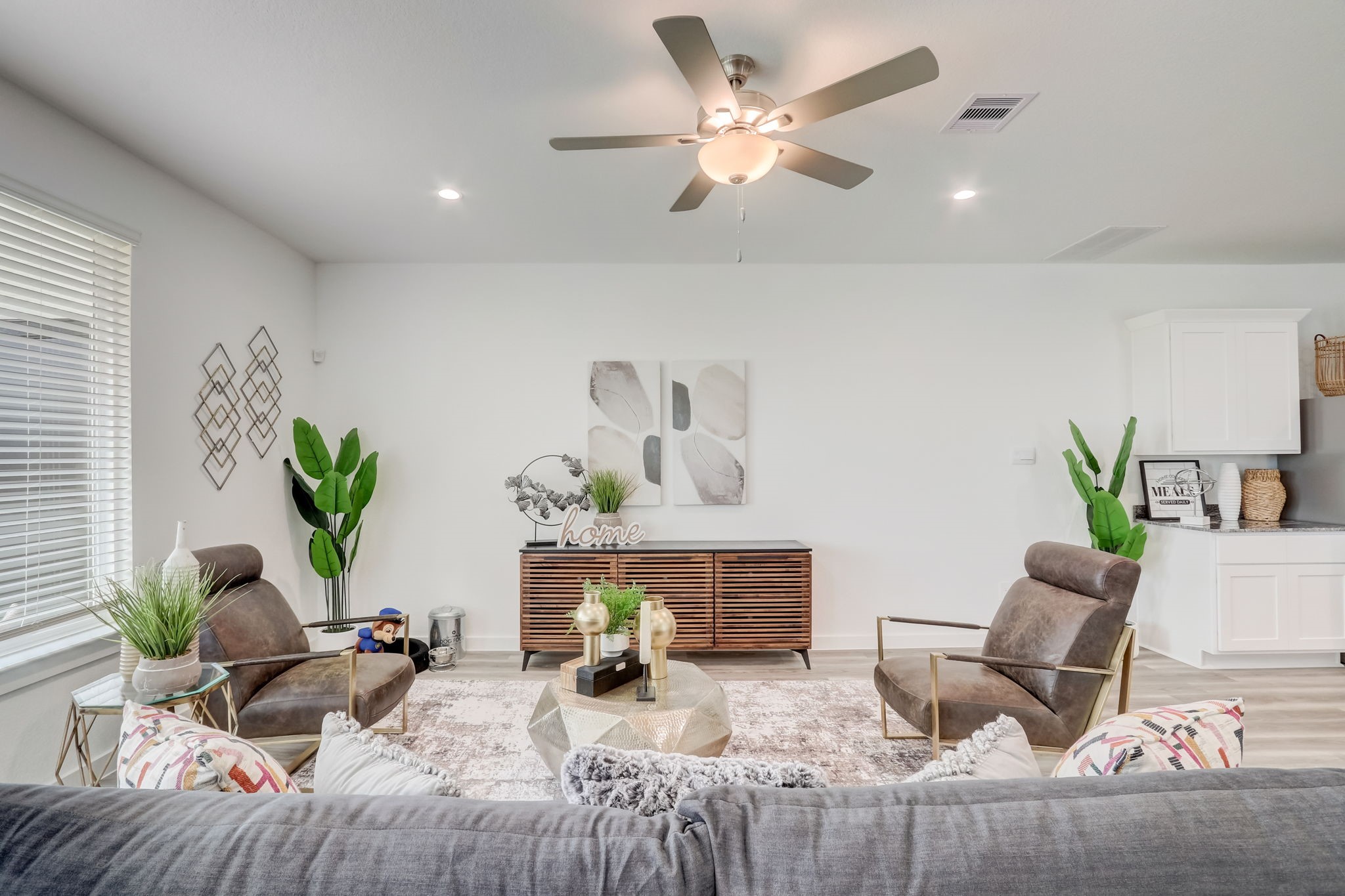 2631 Callahan Springs Lane Houston, TX 77051 - Photo 4 of 50 a living room with furniture chandelier and a potted plant