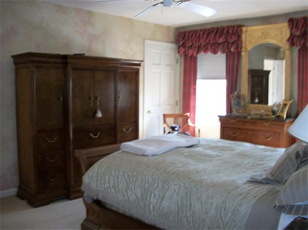23 Elliott Road Sterling, MA 01564 - Photo 19 of 30 a bedroom with a bed and a dresser