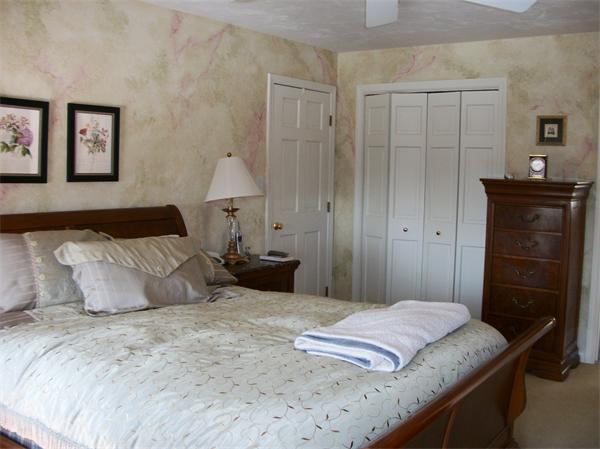 23 Elliott Road Sterling, MA 01564 - Photo 20 of 30 a bedroom with a bed and a closet