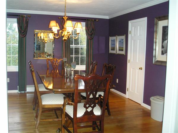 23 Elliott Road Sterling, MA 01564 - Photo 7 of 30 a dining room with furniture a chandelier and wooden floor