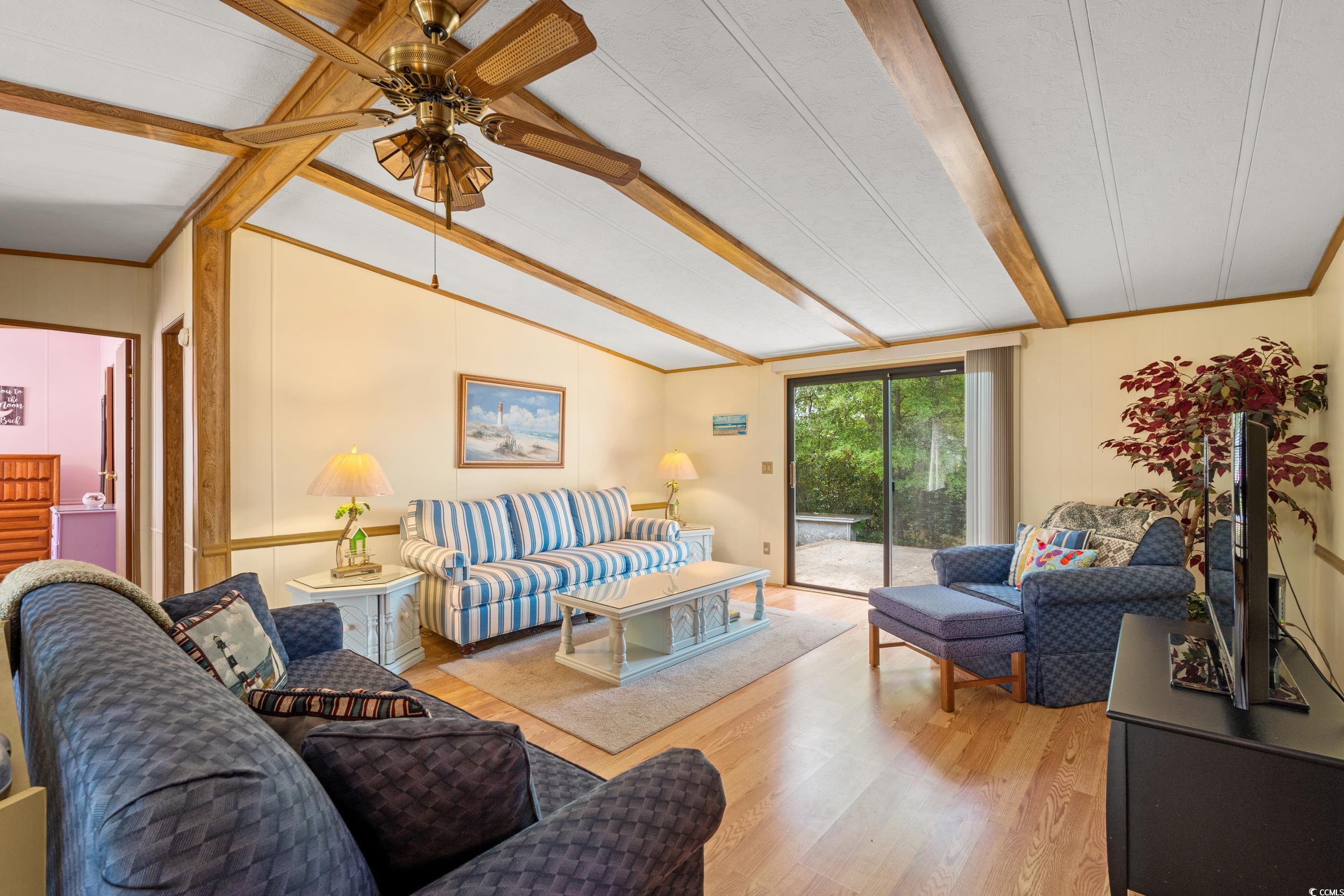 976 South Marlin Circle Murrells Inlet, SC 29576 - Photo 5 of 36 Living room featuring light wood-style flooring, v
