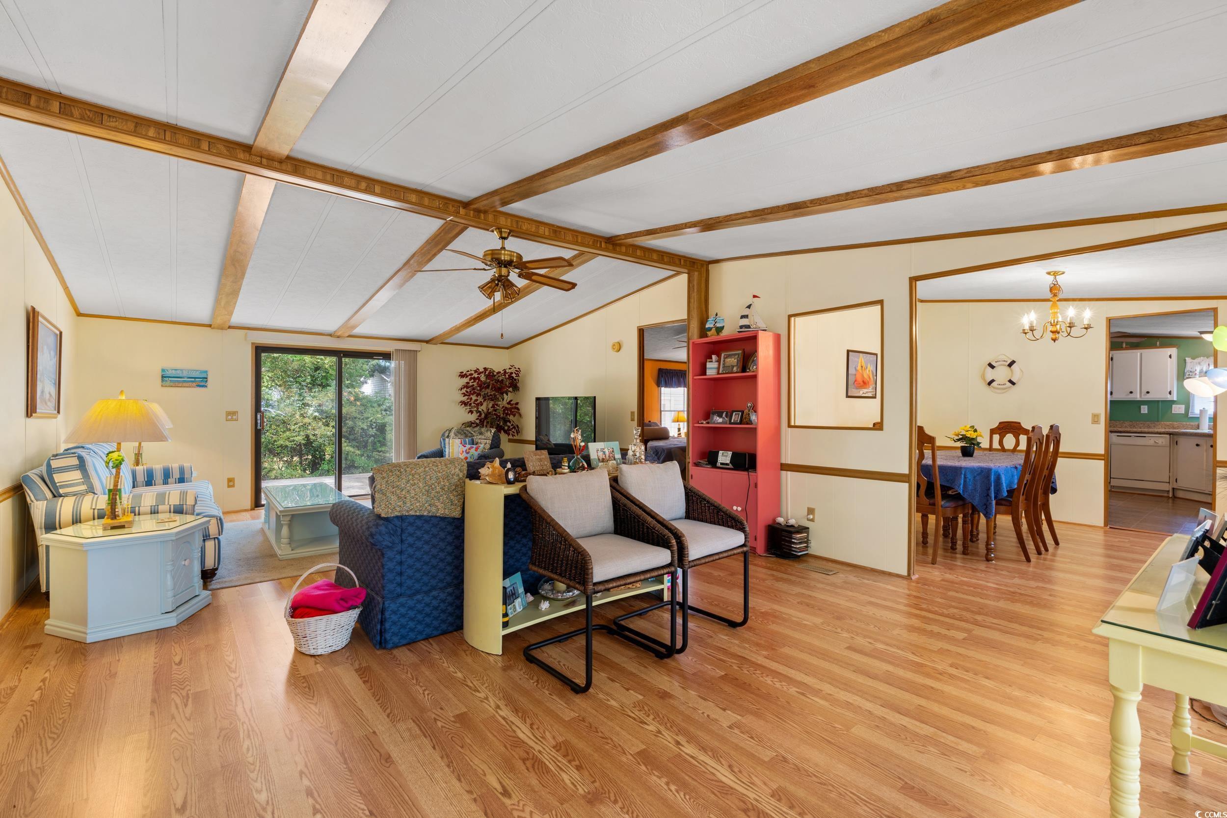 976 South Marlin Circle Murrells Inlet, SC 29576 - Photo 7 of 36 Living area with light wood-style flooring, lofted