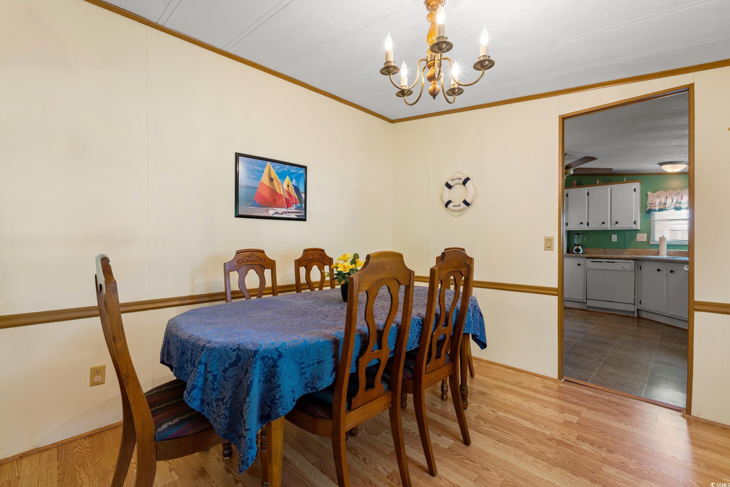 976 South Marlin Circle Murrells Inlet, SC 29576 - Photo 10 of 36 Dining room with ornamental molding, a notable cha