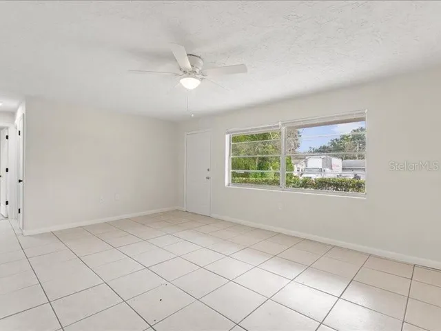 an empty room with windows