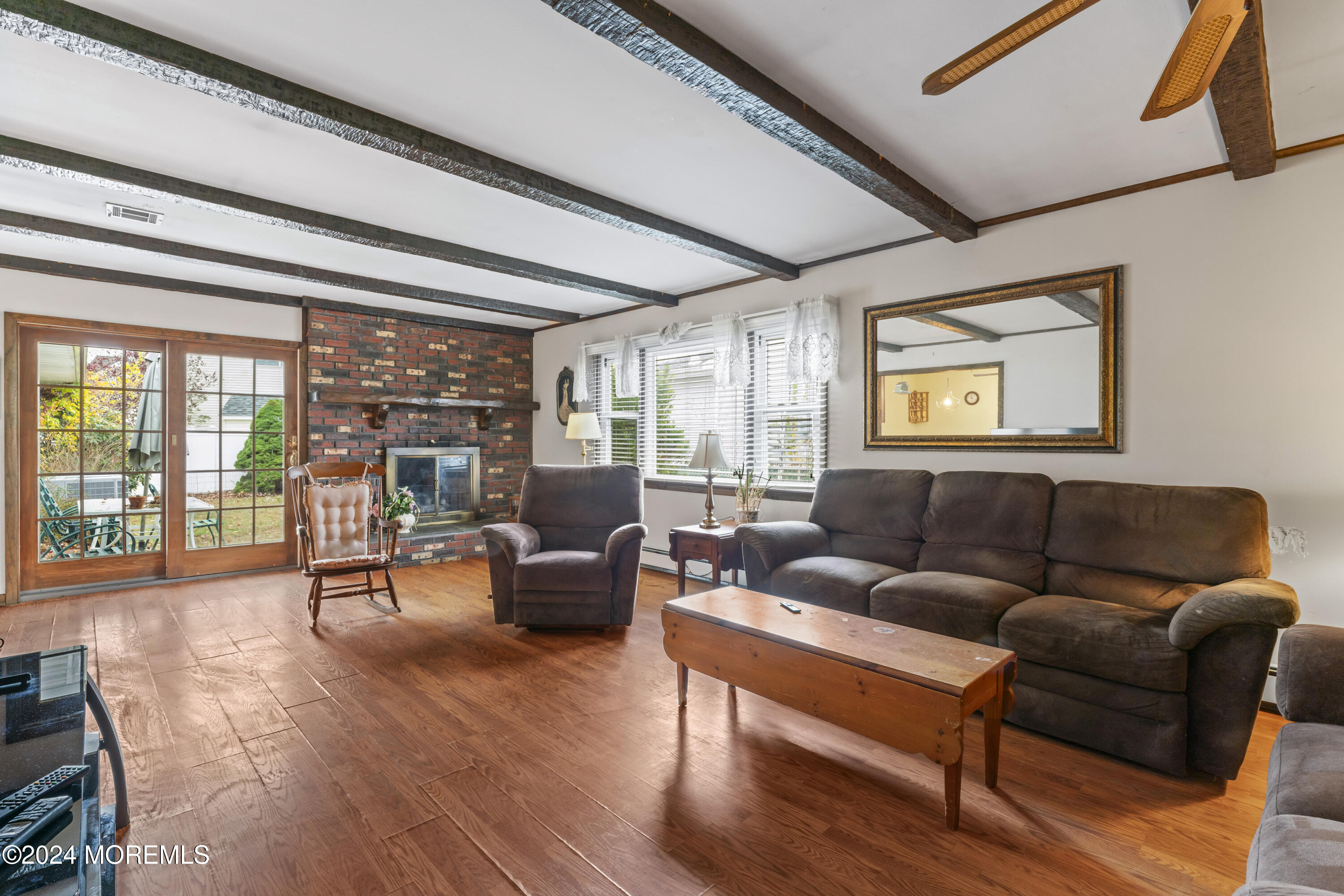 110 Club House Road Brick, NJ 08723 - Photo 23 of 37 a living room with furniture and a large window