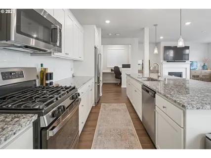 a workspace with furniture and wooden floor