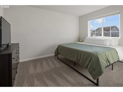 a bathroom with a granite countertop sink two mirror and a