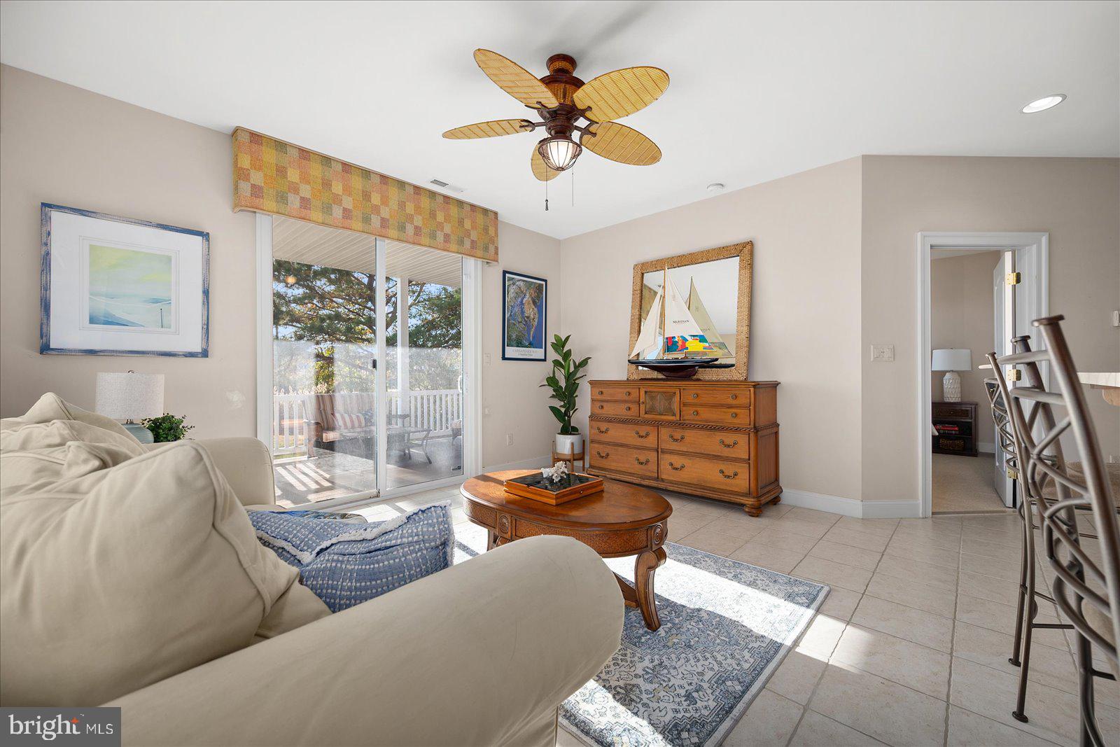 12901 Old Bridge Road, Unit PH8 2 Ocean City, MD 21842 - Photo 47 of 79 a living room with furniture and wooden floor