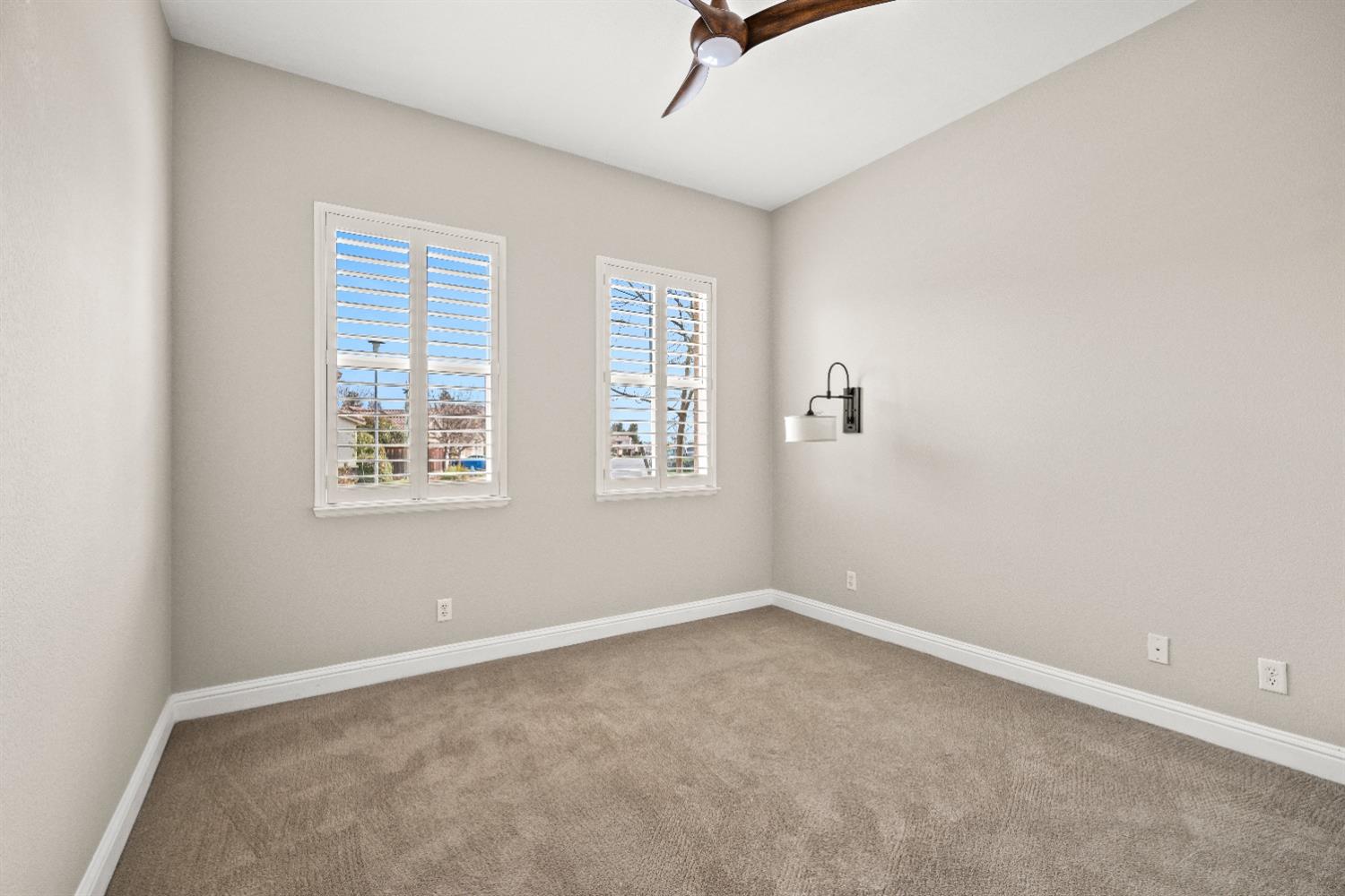 18040 Ruddy Street Woodland, CA 95695 - Photo 25 of 40 an empty room with windows