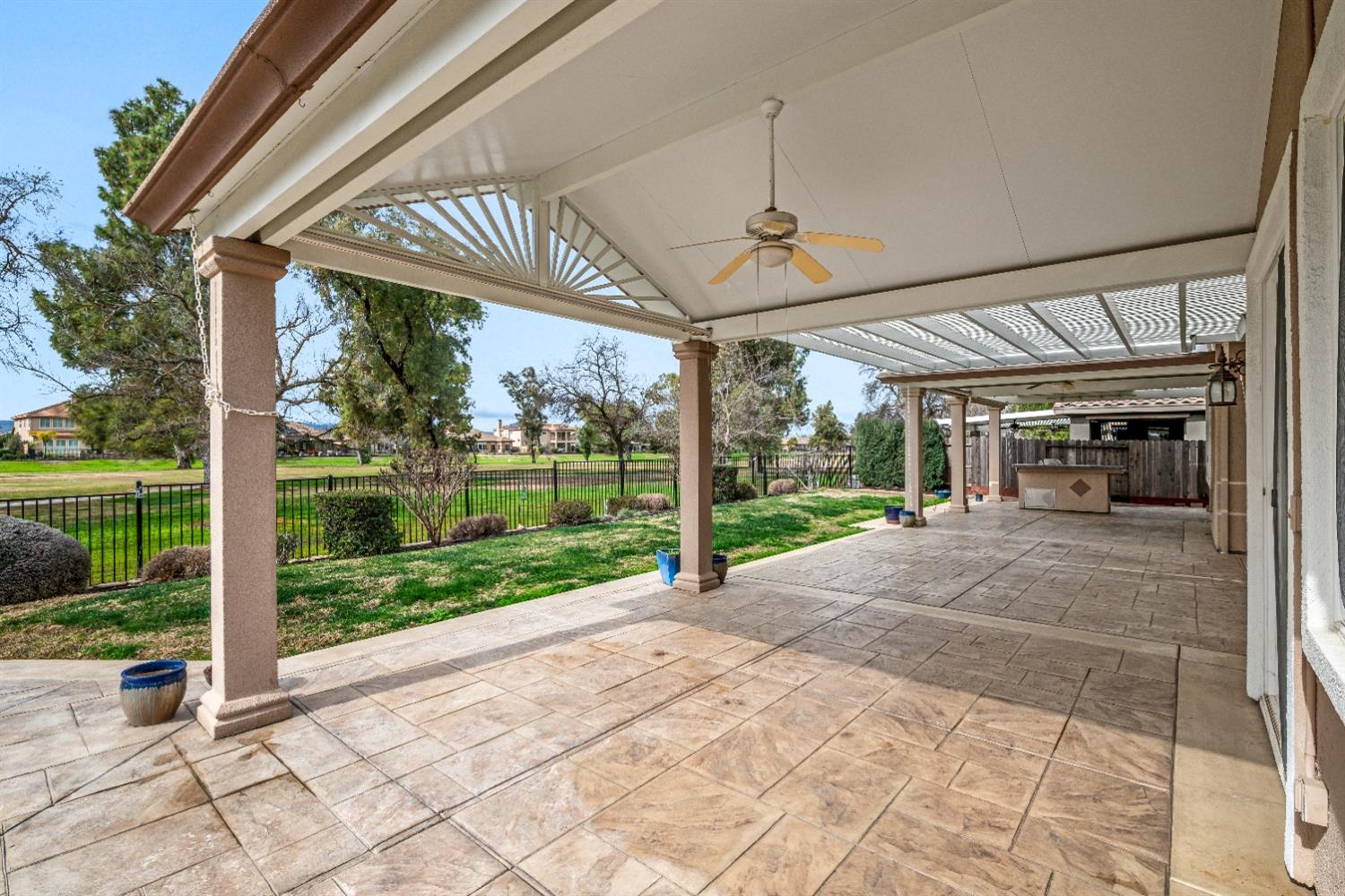18040 Ruddy Street Woodland, CA 95695 - Photo 32 of 40 a view of a porch with a patio