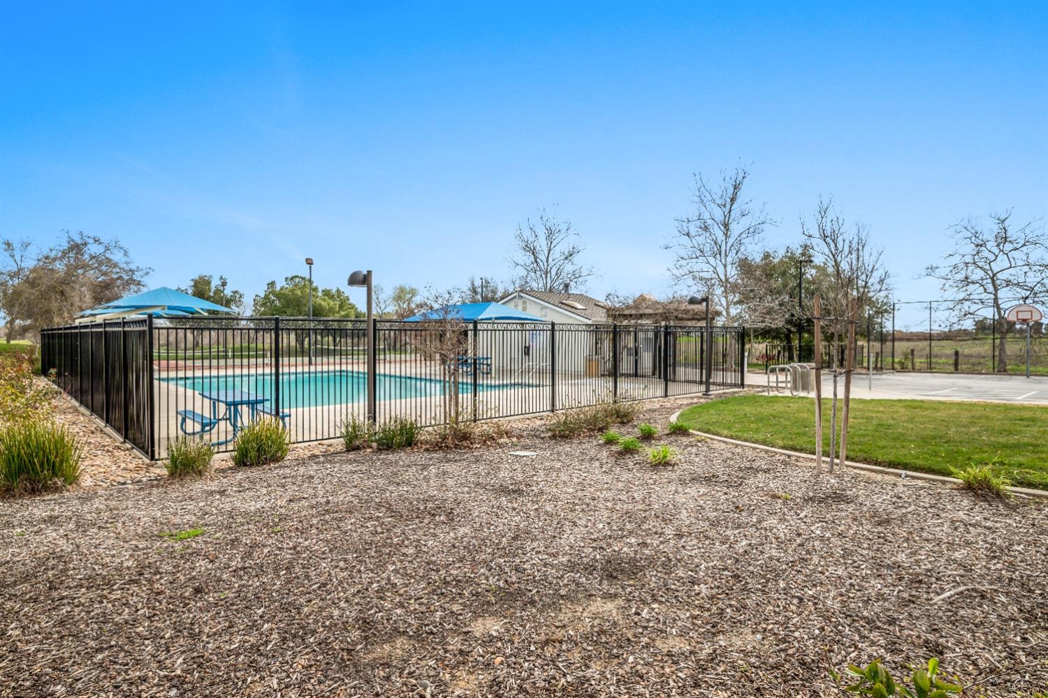 18040 Ruddy Street Woodland, CA 95695 - Photo 38 of 40 a view of a park with a house in the background