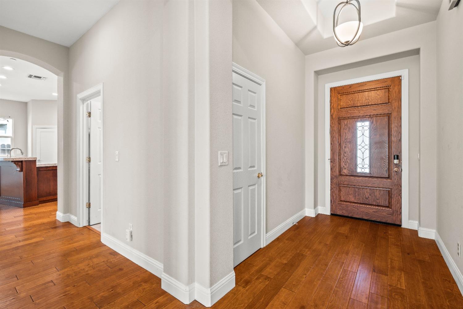18040 Ruddy Street Woodland, CA 95695 - Photo 8 of 40 a view of a livingroom with wooden floor and a bathroom
