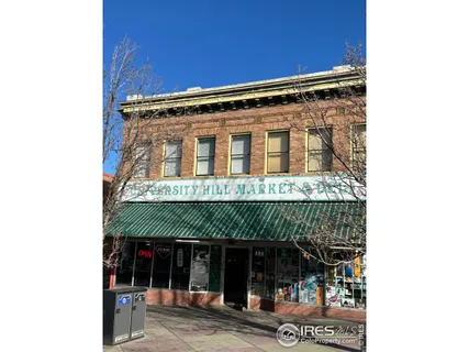 a outdoor space of a house with a large tree