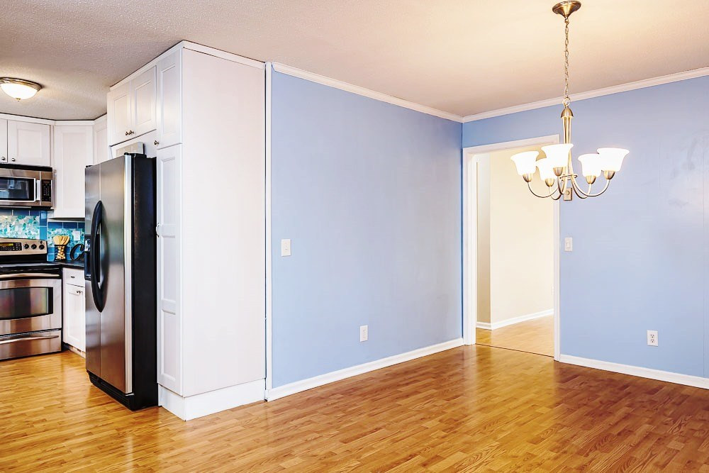 7616 Idolbrook Lane Raleigh, NC 27615 - Photo 12 of 26 Dining Room/Kitchen