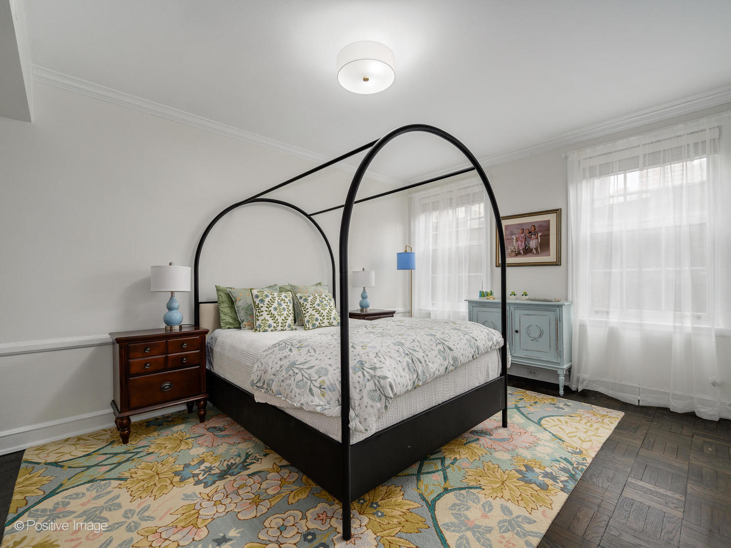73 East Elm Street, Unit 4B Chicago, IL 60611 - Photo 17 of 27 a bed sitting in a bedroom next to a window