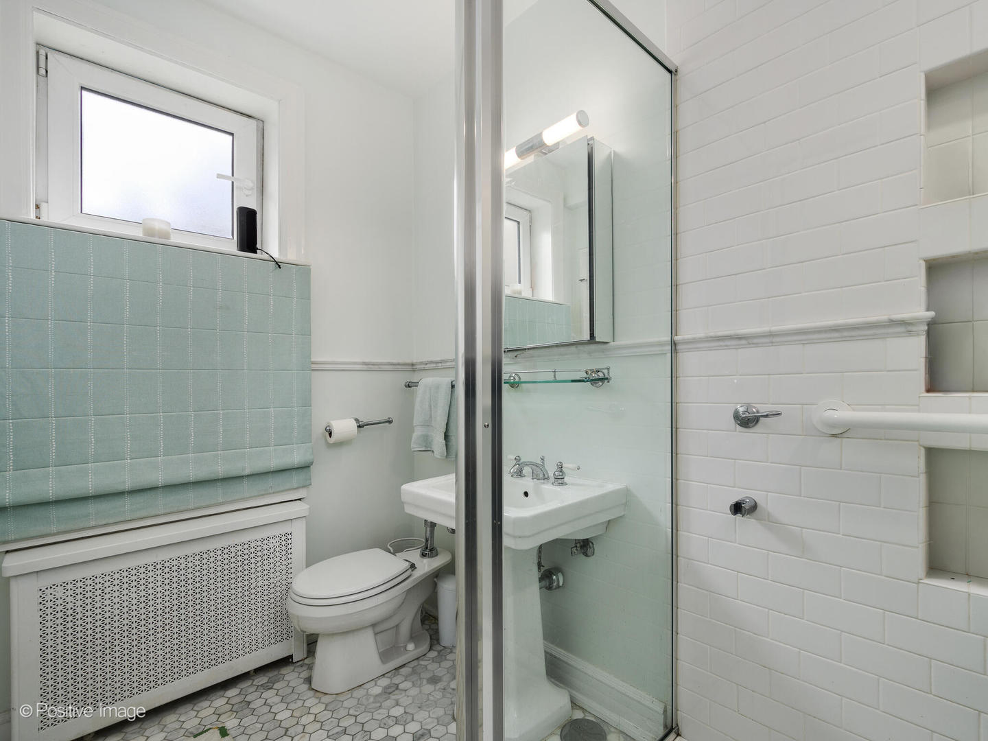 73 East Elm Street, Unit 4B Chicago, IL 60611 - Photo 22 of 27 a bathroom with a toilet a sink and shower