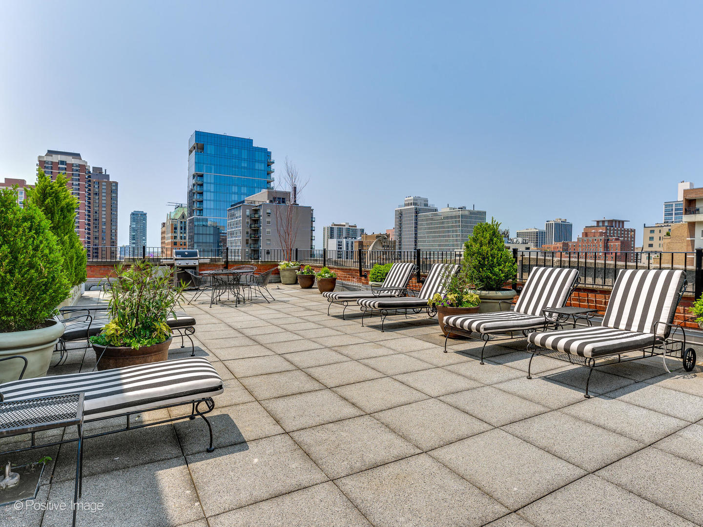 73 East Elm Street, Unit 4B Chicago, IL 60611 - Photo 23 of 27 a view of a terrace with sitting area