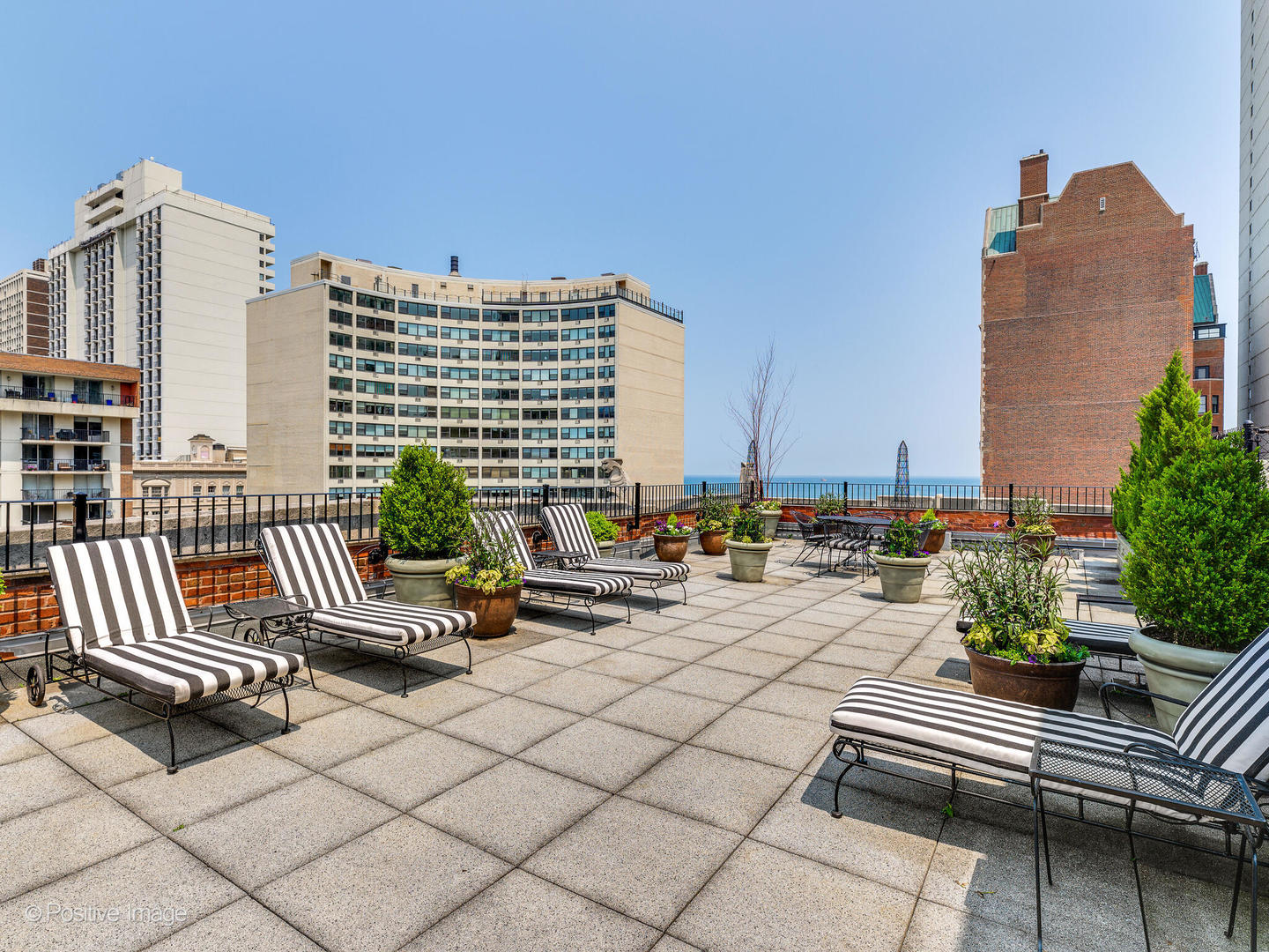 73 East Elm Street, Unit 4B Chicago, IL 60611 - Photo 24 of 27 a view of terrace with seating space and stairs