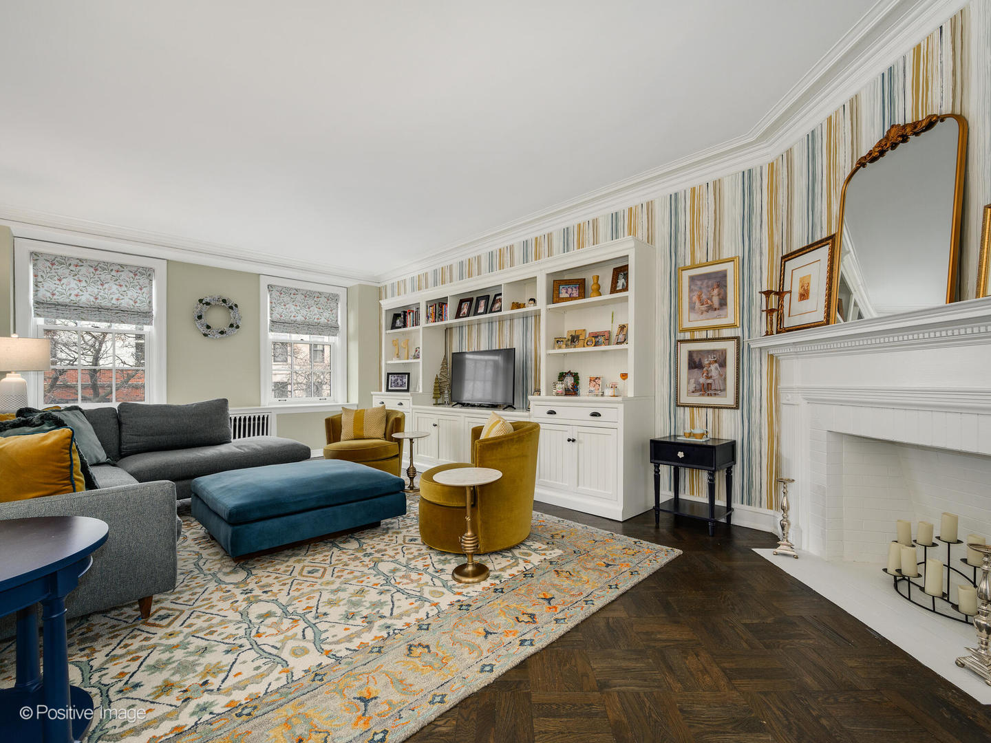 73 East Elm Street, Unit 4B Chicago, IL 60611 - Photo 5 of 27 a living room with furniture and a fireplace