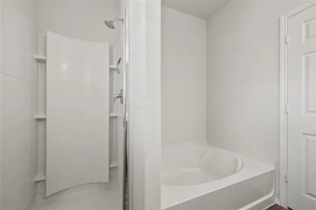 a close view of a bathtub in bathroom