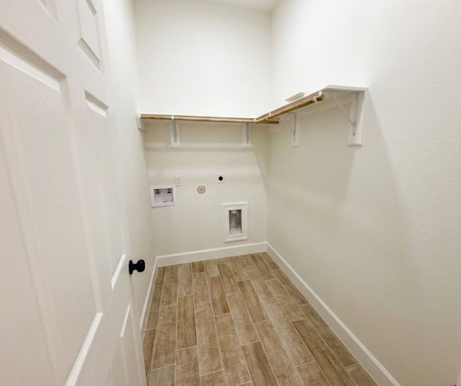 107 County Road 3372 Cleveland, TX 77327 - Photo 12 of 27 a view of wooden floor