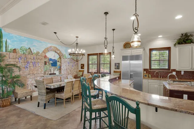 a bedroom with a bed and a night stand