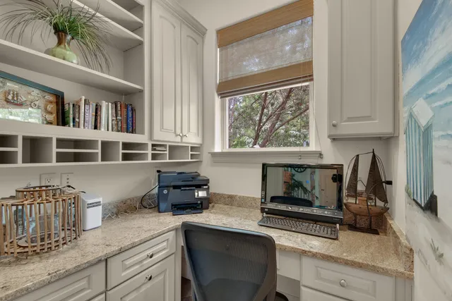 a bedroom with a bed and a lamp