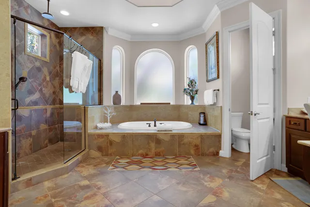 a view of a hallway view with wooden floor and staircase