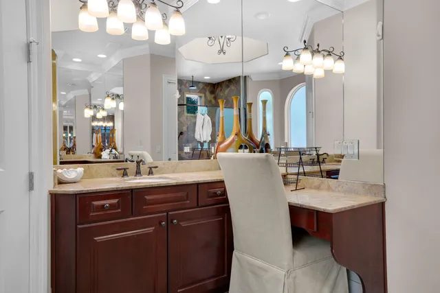 a bedroom with a bed and a wooden floor