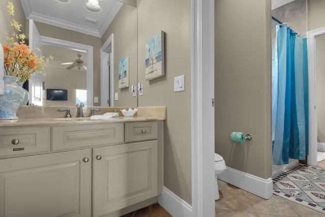 a view of a dining room with furniture wooden floor and chandelier