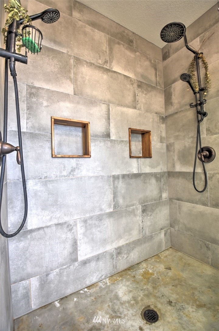 8637 183rd Avenue Southwest Rochester, WA 98579 - Photo 19 of 33 a bathroom with a shower