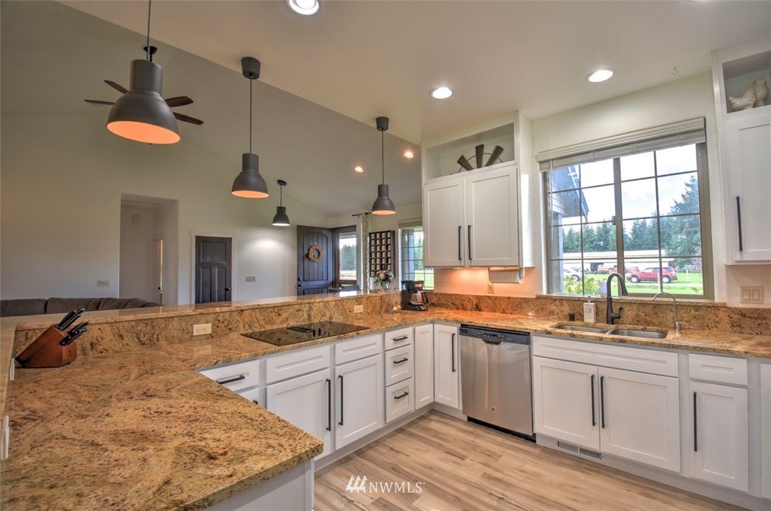 8637 183rd Avenue Southwest Rochester, WA 98579 - Photo 8 of 33 a large kitchen with a window and counter space
