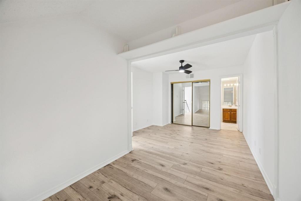 18240 Midway Road, Unit 904 Dallas, TX 75287 - Photo 22 of 26 a view of an empty room and window