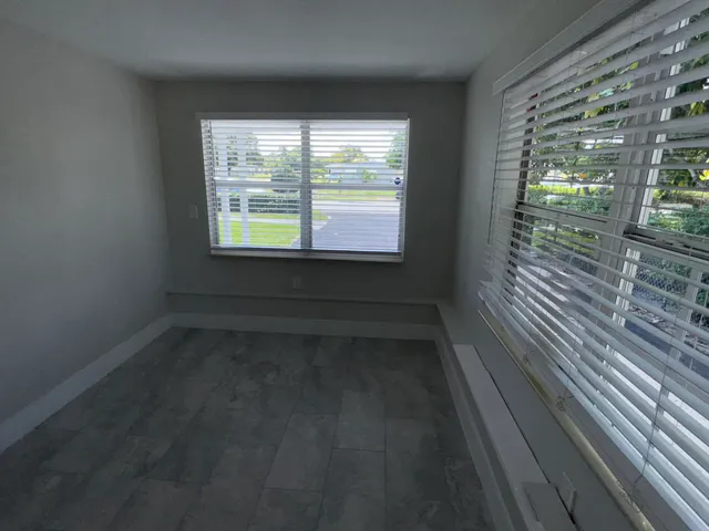 a view of a bathroom with a glass door