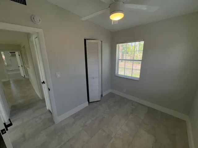 an empty room with window