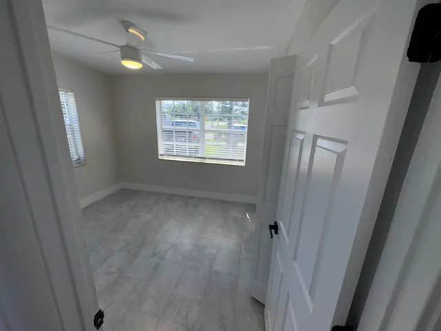 an empty room with windows