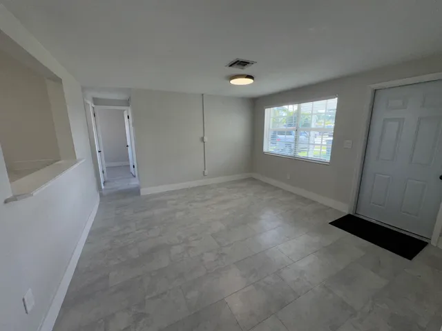 an empty room with windows