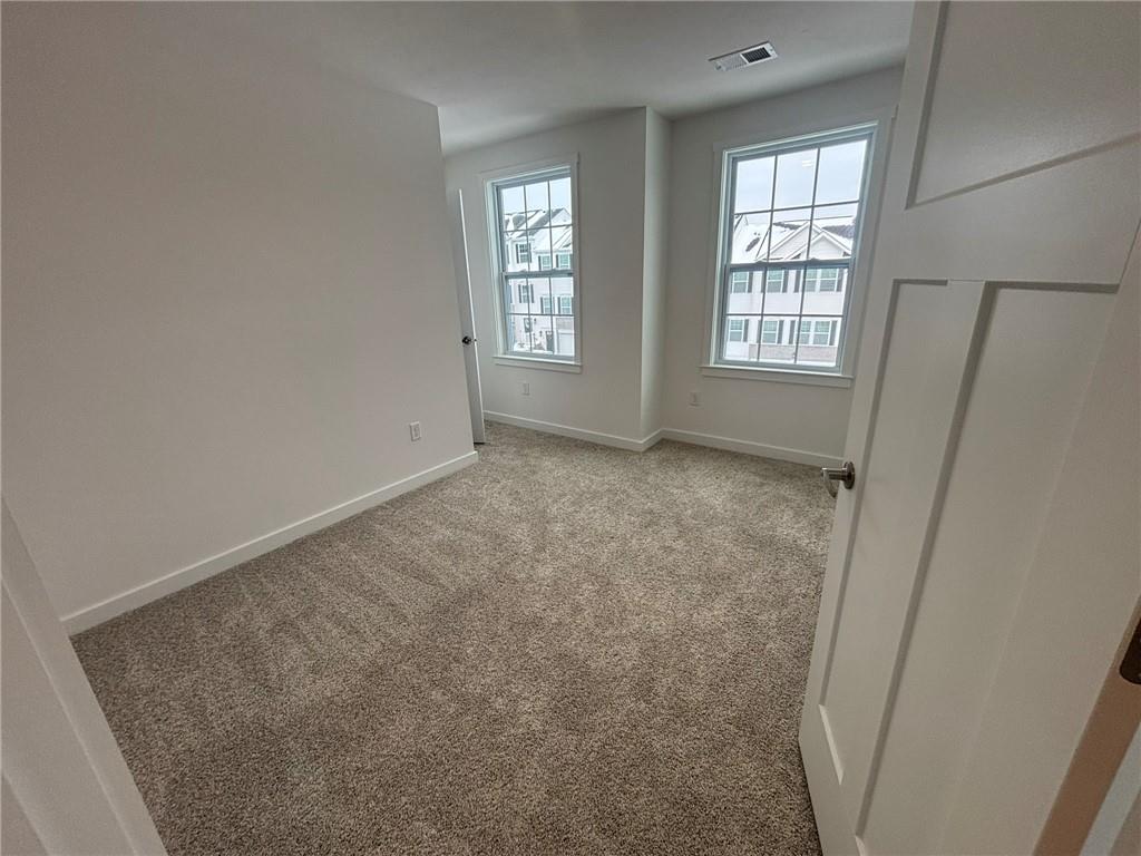 182 Lockheed Drive Coraopolis, PA 15108 - Photo 20 of 22 an empty room with windows