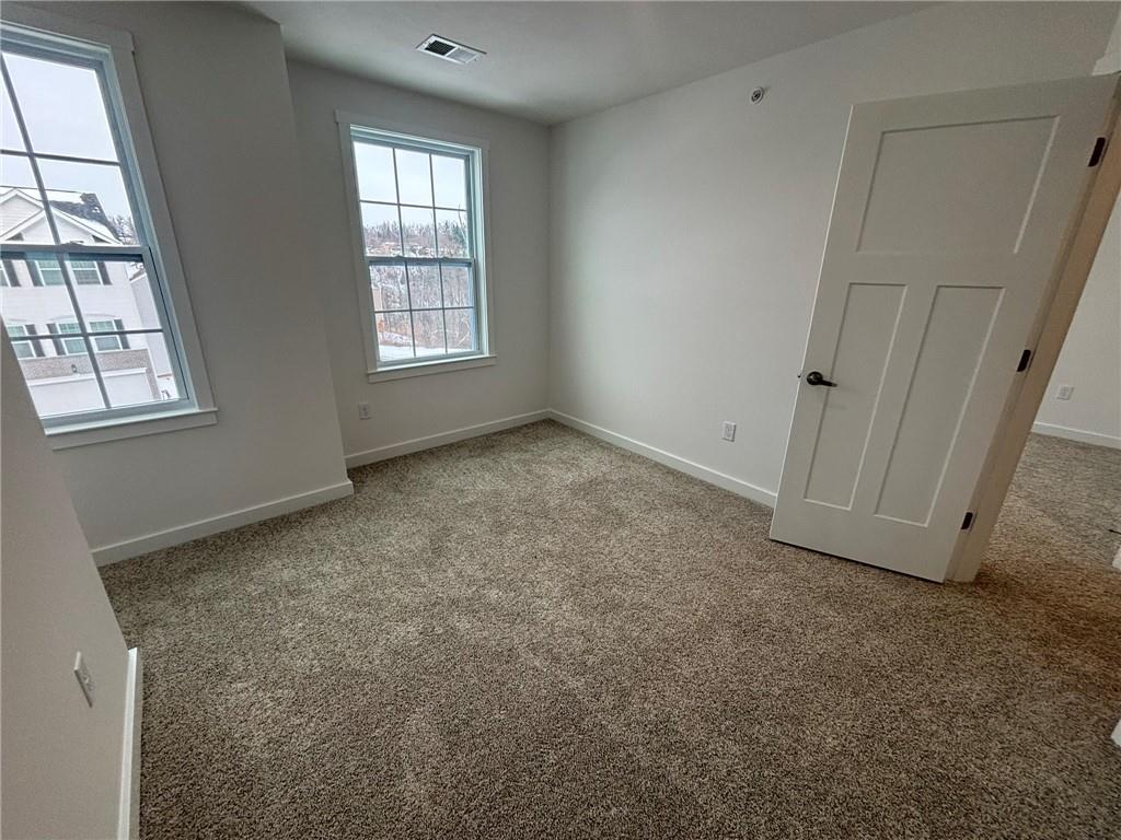182 Lockheed Drive Coraopolis, PA 15108 - Photo 21 of 22 an empty room with windows