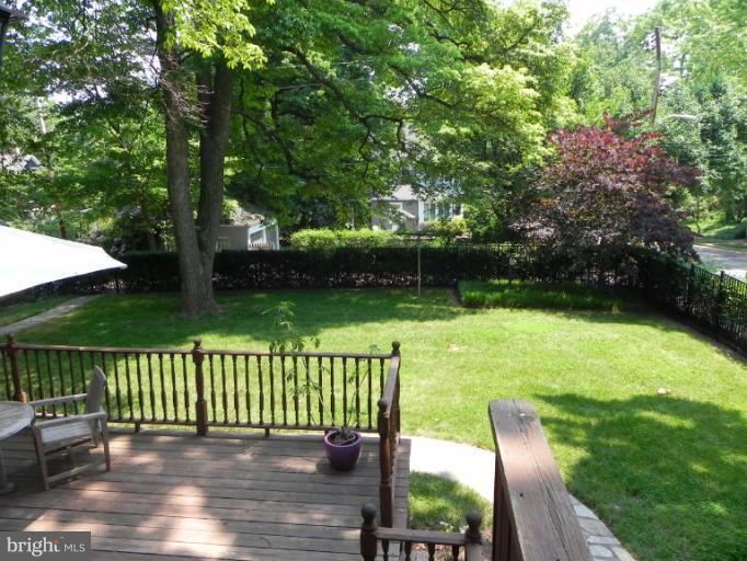401 Hawthorn Road Baltimore, MD 21210 - Photo 14 of 26 a view of a deck with a garden