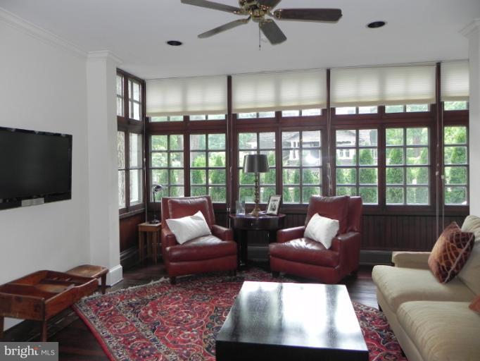 401 Hawthorn Road Baltimore, MD 21210 - Photo 21 of 26 a living room with furniture and a flat screen tv