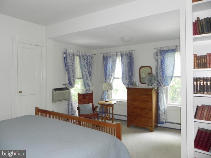 401 Hawthorn Road Baltimore, MD 21210 - Photo 22 of 26 a bedroom with furniture and a window