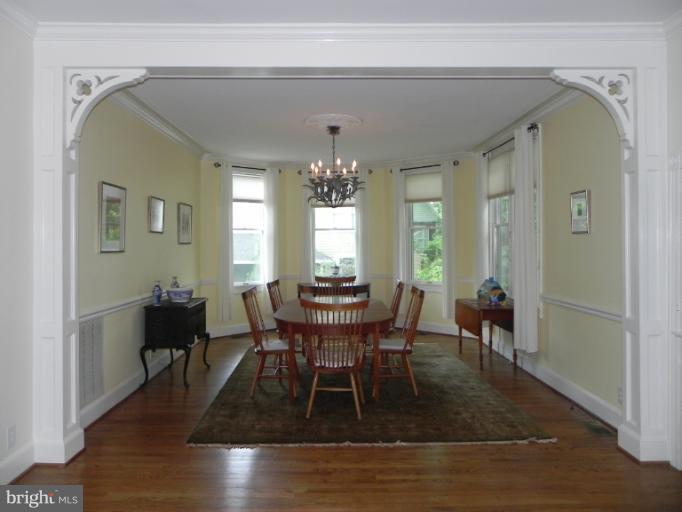 401 Hawthorn Road Baltimore, MD 21210 - Photo 6 of 26 a view of a dining room with furniture and window