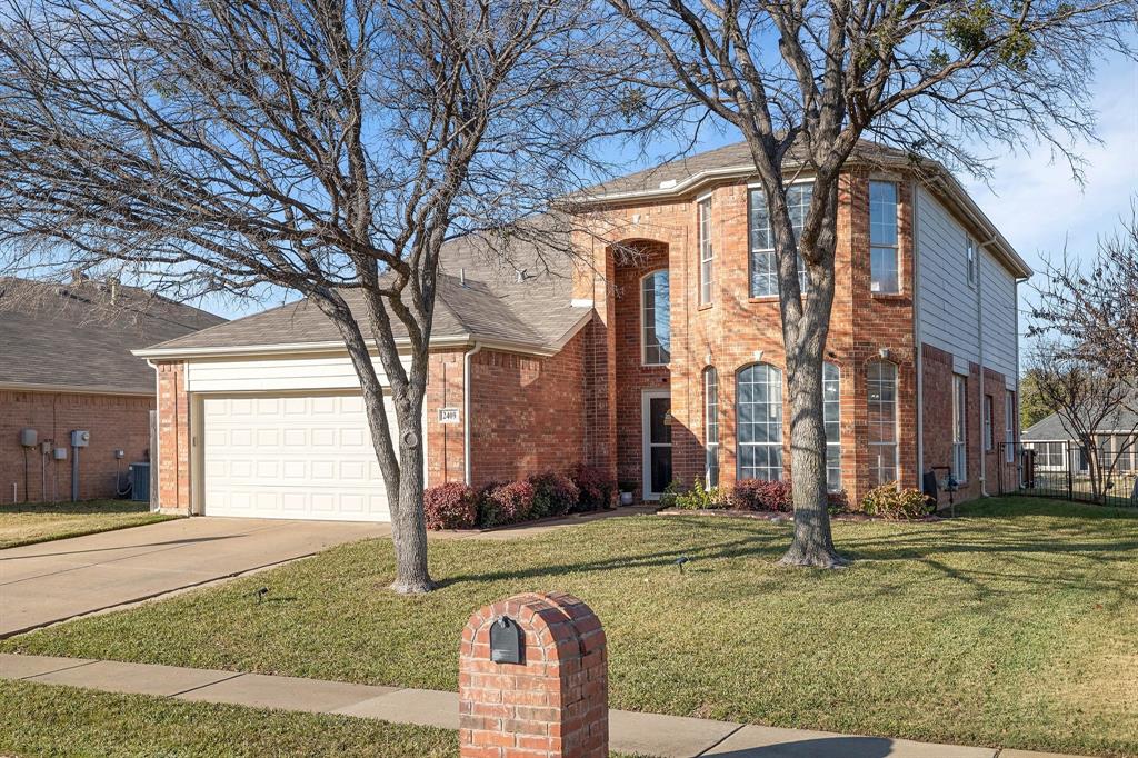 2409 Loon Lake Road Denton, TX 76210 - Photo 1 of 1 a front view of a house with garden